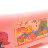 Poochie pencil case with glue or melted plastic