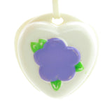Poochie clip-on ink stamp with purple flower