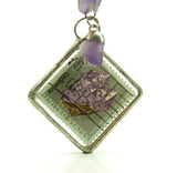 Soldered pendant necklace with real postage stamps