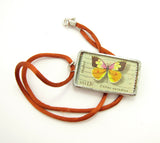 Soldered glass pendant necklace with butterfly stamp