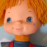 Rainbow Brite doll with brown mark near mouth