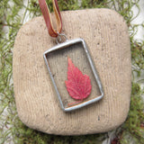 Red maple leaf in soldered glass pendant necklace