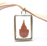 Red maple leaf in soldered glass pendant