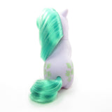 Seashell sitting pony with green hair