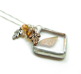 Brown autumn fairy wing in soldered glass pendant