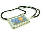 Recycled glass is used on this Halloween necklace featuring Ichabod Crane and the Headless Horseman.