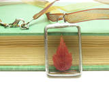 Red maple leaf in soldered glass pendant