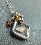 Soldered glass fairy wing necklace with oak leaf charms