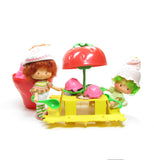Strawberry Shortcake Snail Cart playset with strawberry umbrella