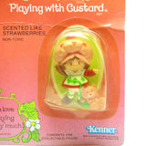 Strawberry Shortcake with green yarn ball figurine