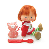 Vintage Strawberry Shortcake doll with Custard cat pet and red berry comb