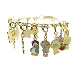 Strawberry Shortcake charms on gold charm bracelet