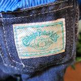 Cabbage Patch Kids tag on doll jeans