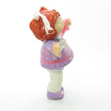 Cabbage Patch Kids poseable figure girl with red hair and purple dress