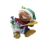 Santa's helper making a robot ornament