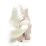 Baby Blossom pony with white mane and tail