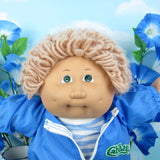 Cabbage Patch Kids boy doll with light brown hair, green eyes, freckles and dimples