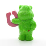 Good Luck Bear holding a lucky horseshoe vintage Care Bears miniature figurine