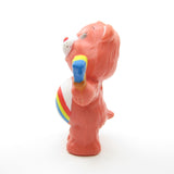 Cheer Bear painting a colorful rainbow Care Bears figurine
