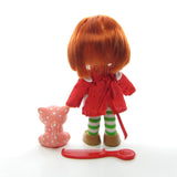 Vintage Strawberry Shortcake doll with Custard cat pet and red berry comb