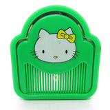 Hello Kitty green plastic pocket mirror and comb