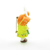 Hallmark pixie girl pin with yellow dress and orange bonnet