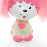 Pink poodle dog toy with Poochie identification tag