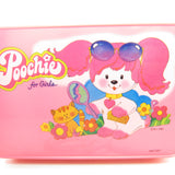 Poochie with comb and mirror on front of Poochie plastic case