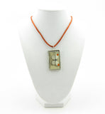 Soldered pendant with orange-tip butterfly stamp
