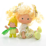 Strawberry Shortcake Berrykin Banana Twirl doll and Banana Berrykin critter