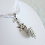 Snowflake Pine Cone Necklace on White Ribbon